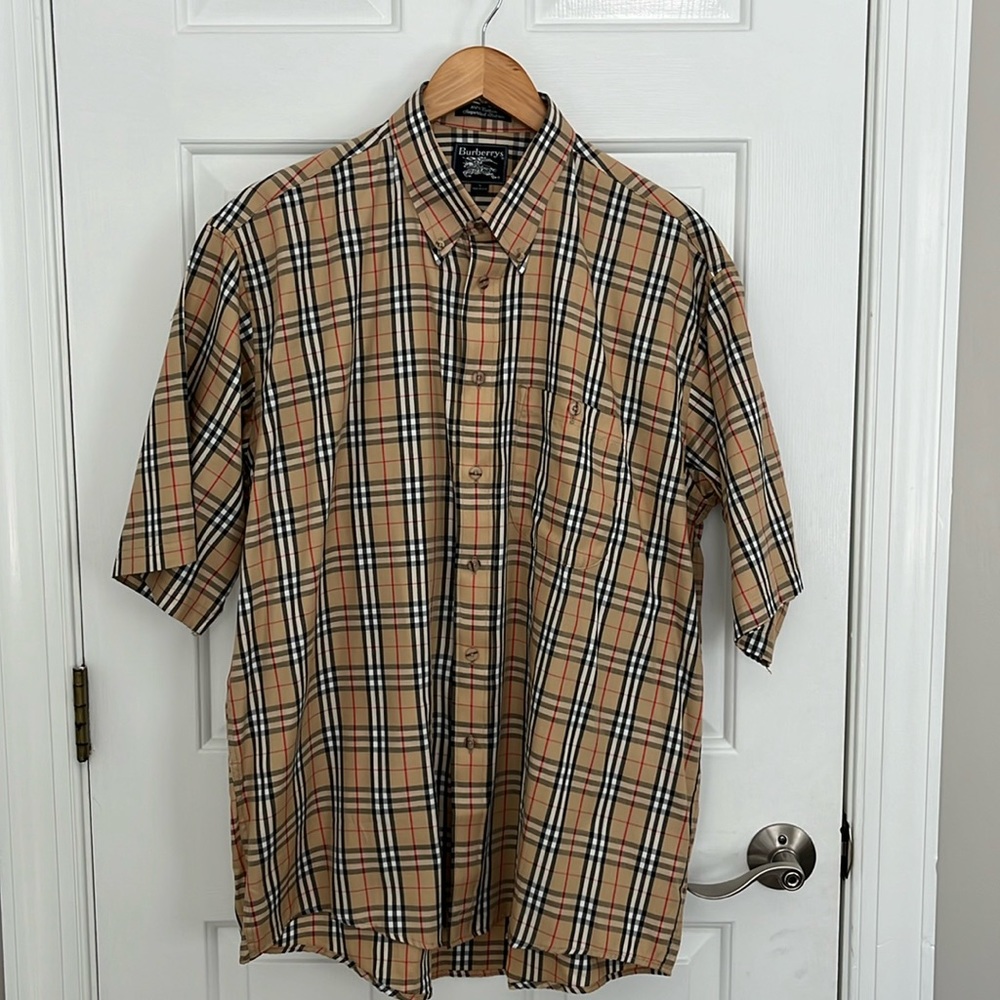 Burberrys.  Vintage men’s classic Burbery pattern.  Tan, black and red.